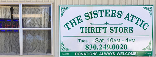 Photo of Business Sign with Hours Open Tues through Sat from 10am to 4pm.